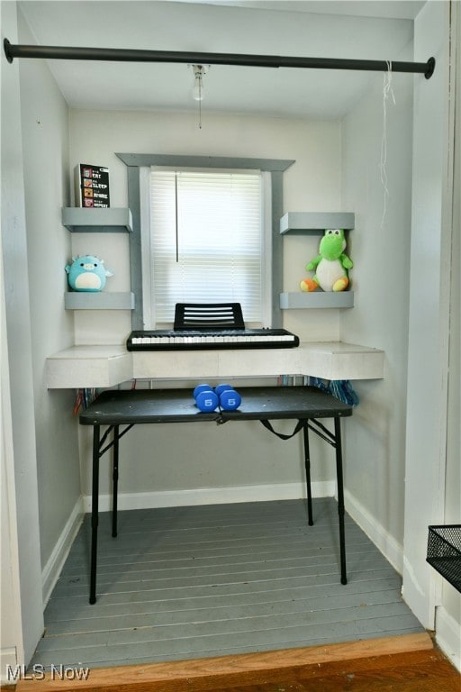 misc room with dark hardwood / wood-style floors