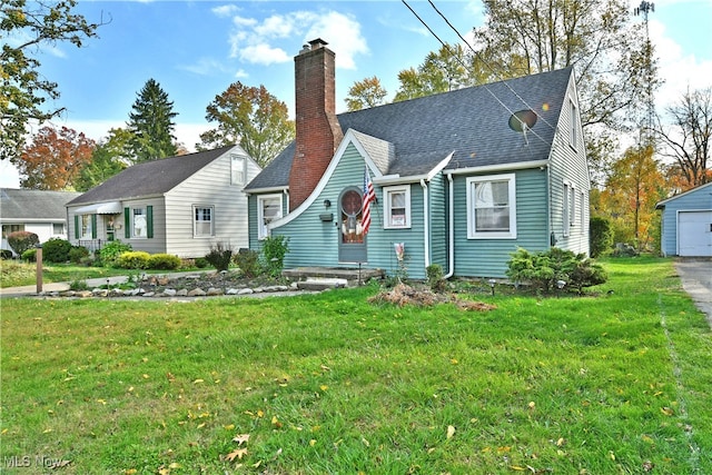 view of front of house featuring a front yard and a garage