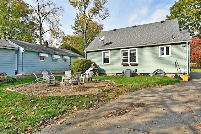 back of property featuring cooling unit