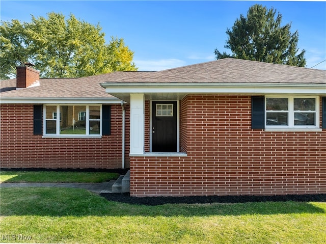 view of home's exterior featuring a yard