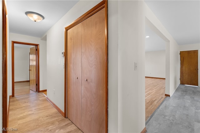 hall with light hardwood / wood-style floors