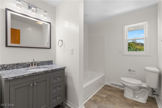 full bathroom with vanity, toilet, and shower / bathing tub combination