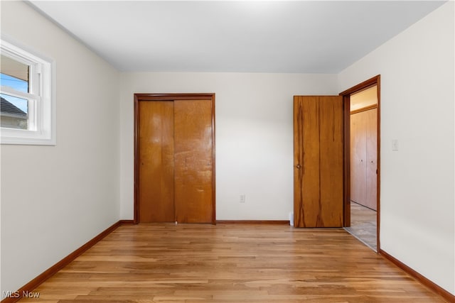 unfurnished bedroom with light hardwood / wood-style flooring