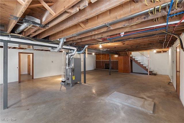 basement featuring heating unit