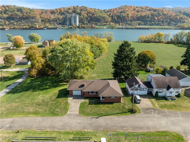 birds eye view of property featuring a rural view and a water view