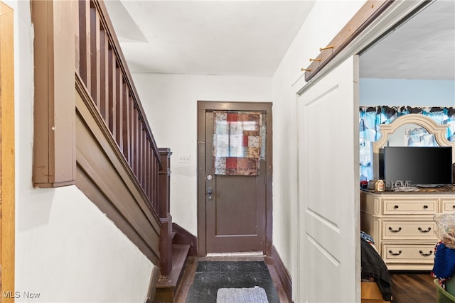 interior space with dark hardwood / wood-style flooring