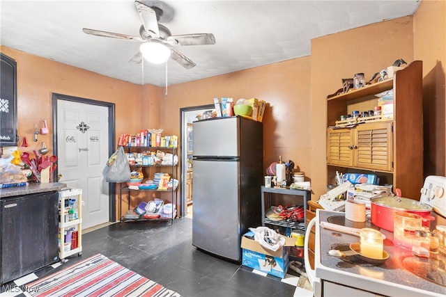 kitchen with ceiling fan and stainless steel refrigerator