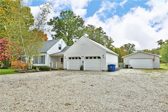 view of front of house with an outdoor structure