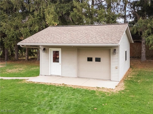 garage with a lawn