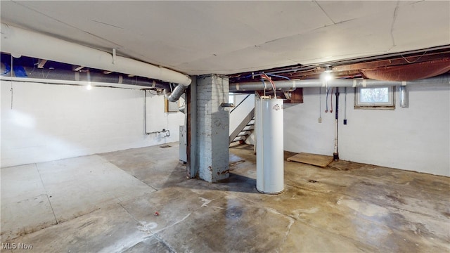 basement featuring water heater and heating unit