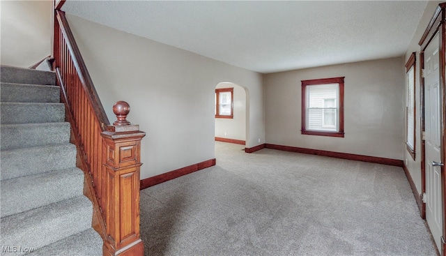 interior space featuring a textured ceiling