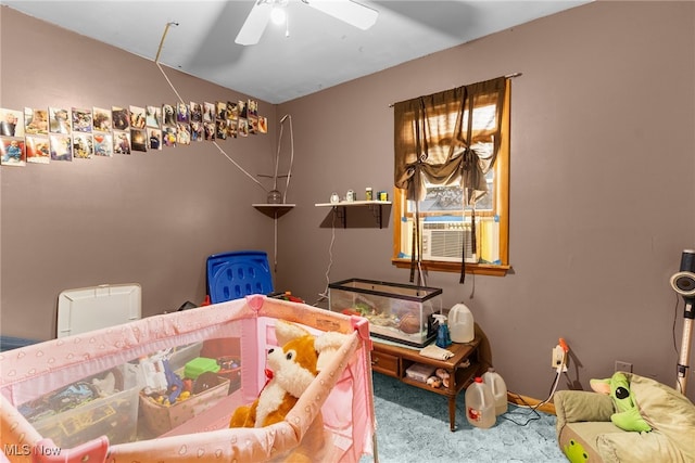 bedroom with cooling unit and carpet flooring