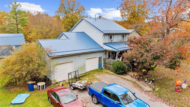 back of property with covered porch