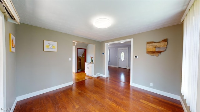 entryway with wood-type flooring