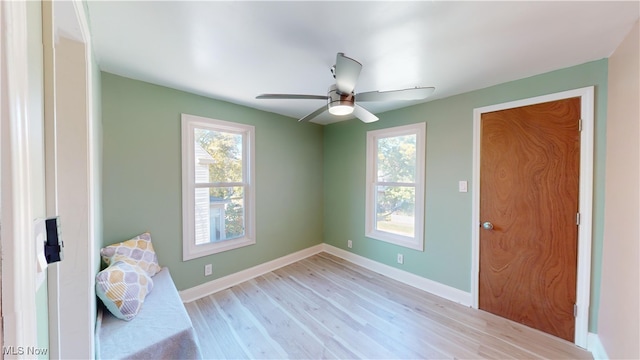 interior space featuring light hardwood / wood-style flooring and ceiling fan