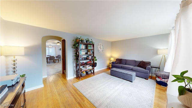 living room with light hardwood / wood-style flooring