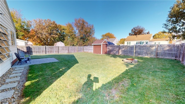 view of yard with a patio area and a shed