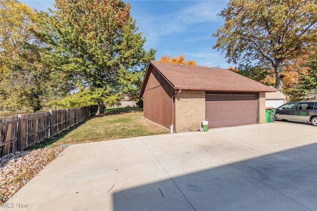 garage with a lawn