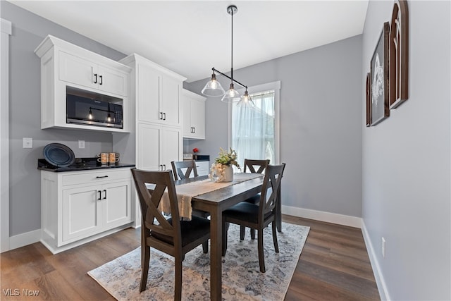 dining room featuring dark hardwood / wood-style floors