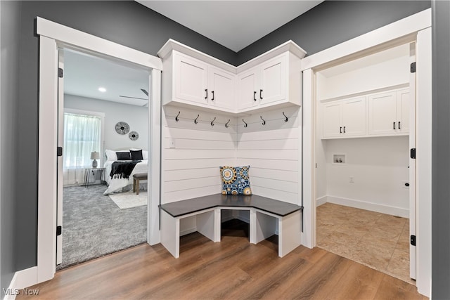 mudroom with hardwood / wood-style floors