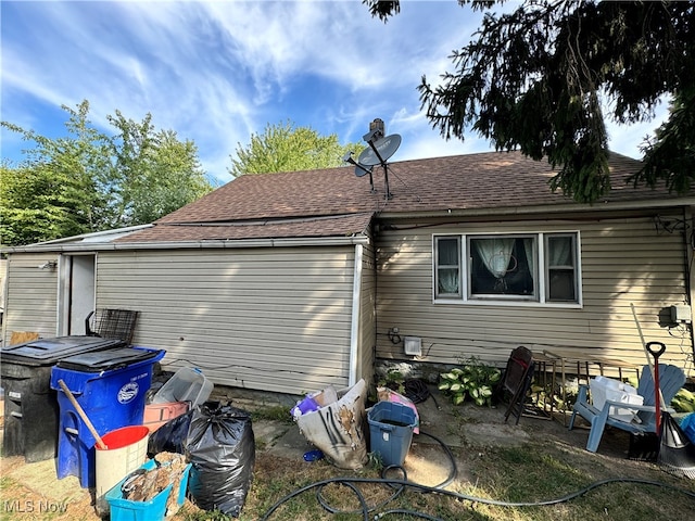 back of house with a patio