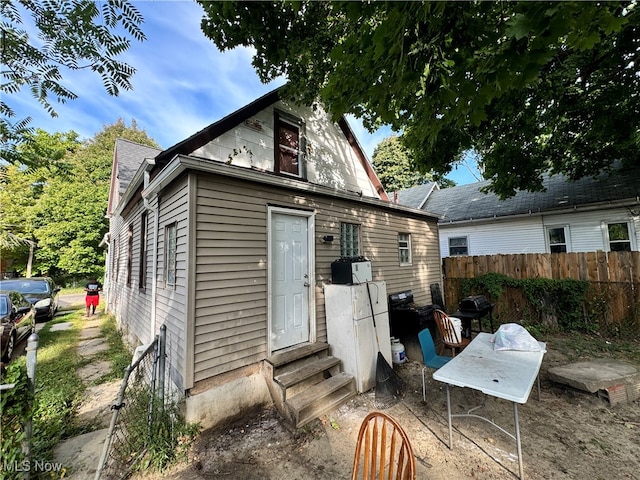 back of house featuring a patio