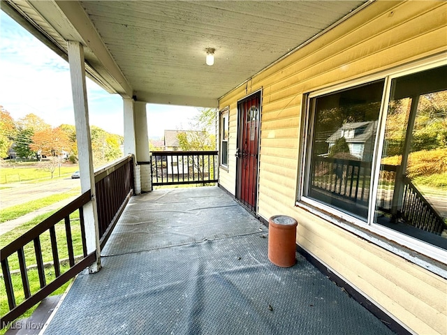 balcony featuring a porch