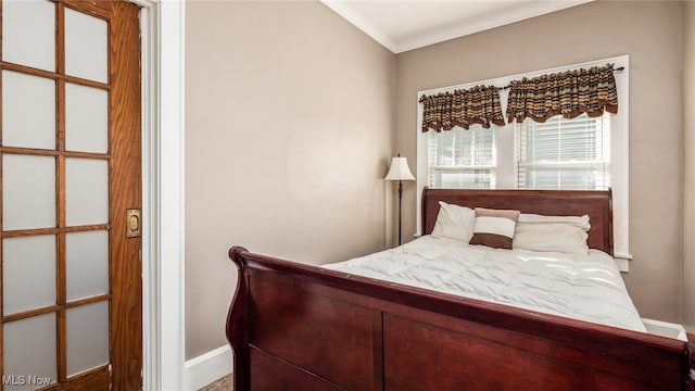 bedroom featuring crown molding