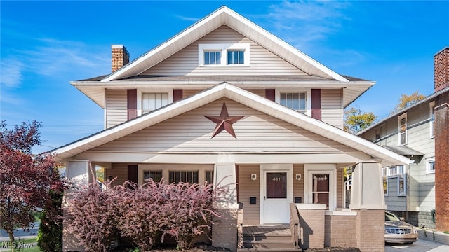 view of front of home featuring covered porch