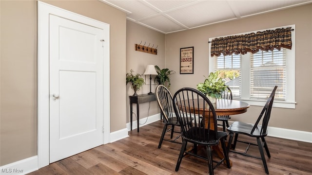 dining room with hardwood / wood-style flooring