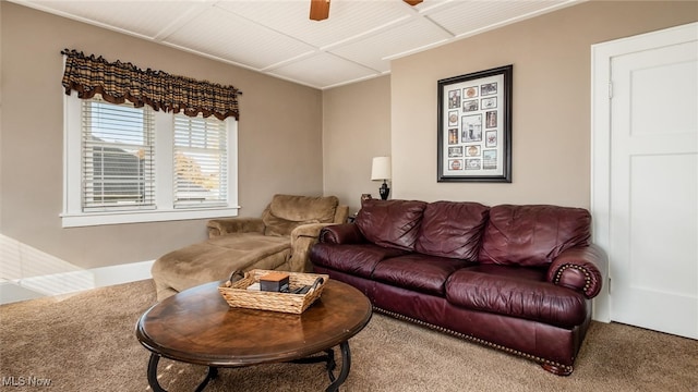 living room featuring carpet floors and ceiling fan