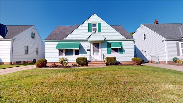 view of front of home with a front yard