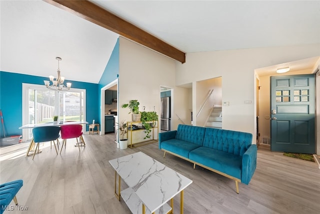 living room featuring beam ceiling, a notable chandelier, high vaulted ceiling, and light wood-type flooring