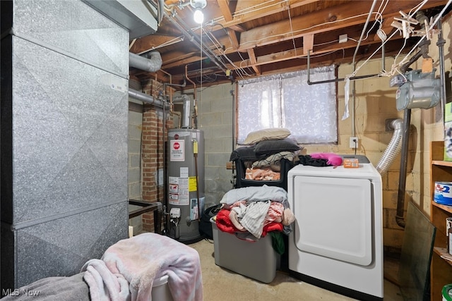 basement with washer / dryer and water heater