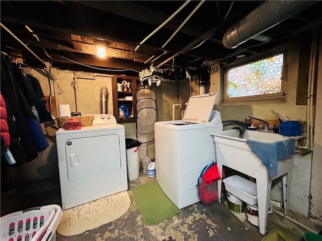 laundry room featuring washing machine and clothes dryer