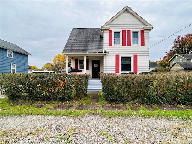 front facade featuring covered porch