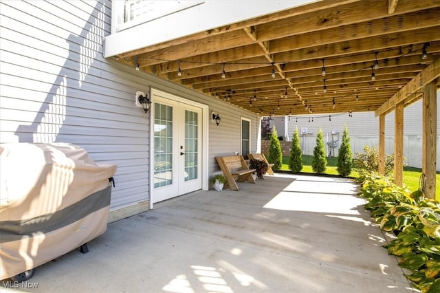 view of patio with french doors and grilling area