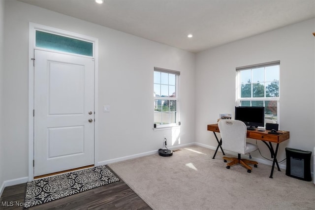 office area with wood-type flooring and a wealth of natural light