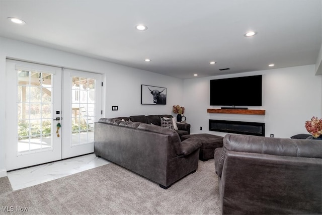 carpeted living room with french doors