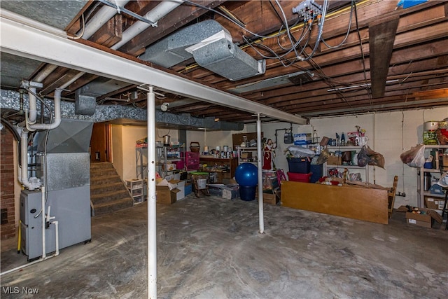 basement featuring heating unit