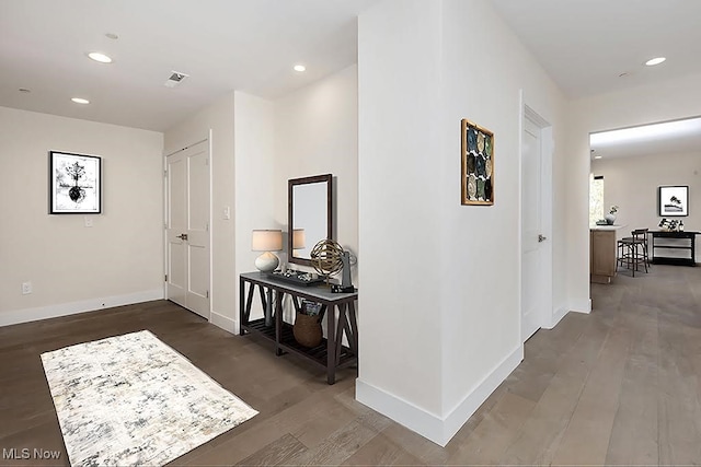 hall featuring dark hardwood / wood-style flooring