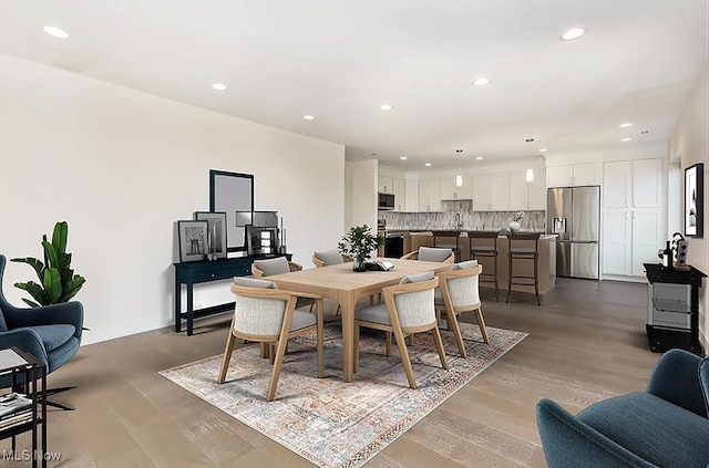 dining room featuring light hardwood / wood-style flooring