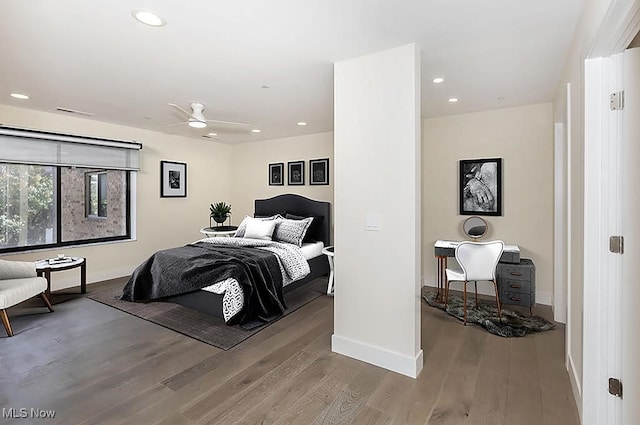 bedroom featuring hardwood / wood-style floors and ceiling fan