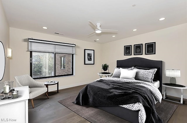 bedroom featuring ceiling fan and hardwood / wood-style floors