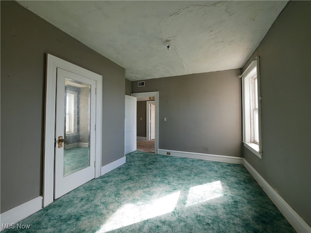 view of carpeted spare room