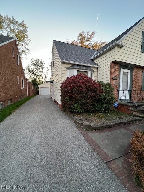 view of property exterior at dusk