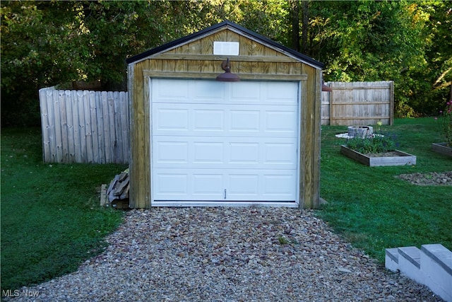 garage with a yard