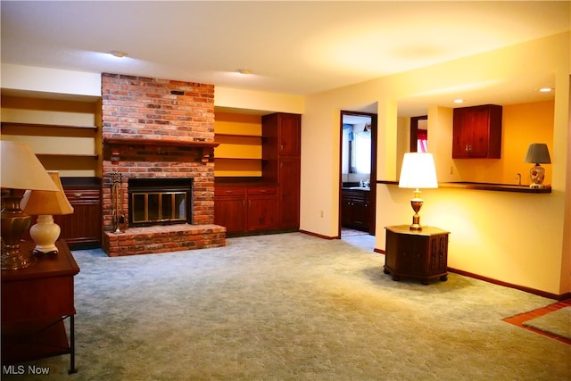 carpeted living room with a fireplace