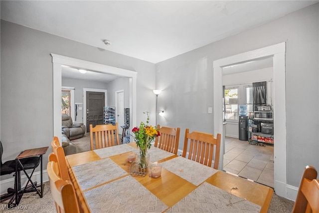 dining room featuring light tile patterned floors