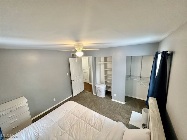 bedroom featuring dark carpet and ceiling fan